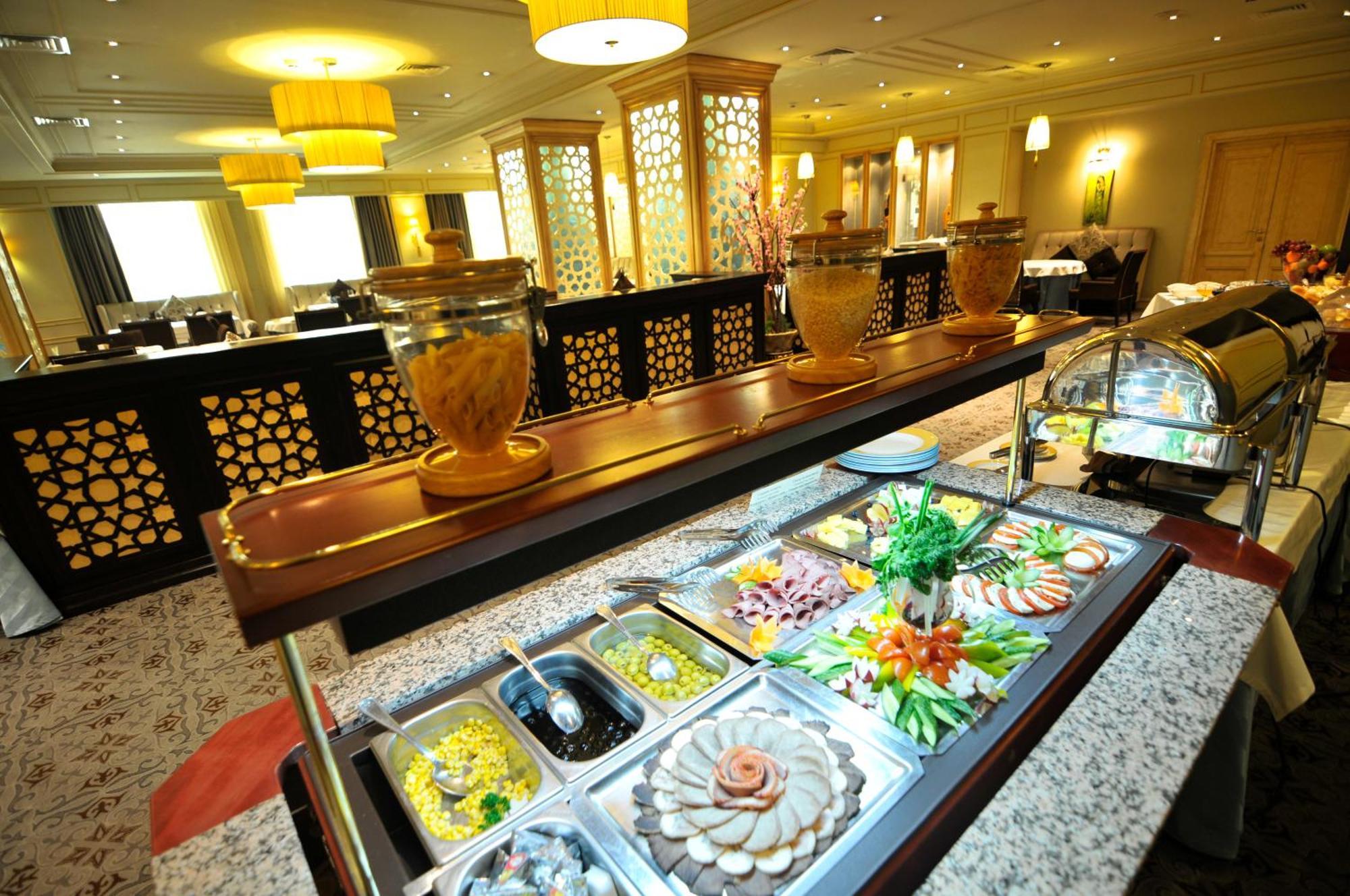 Grand Tien Shan Hotel Almaty Restaurant foto