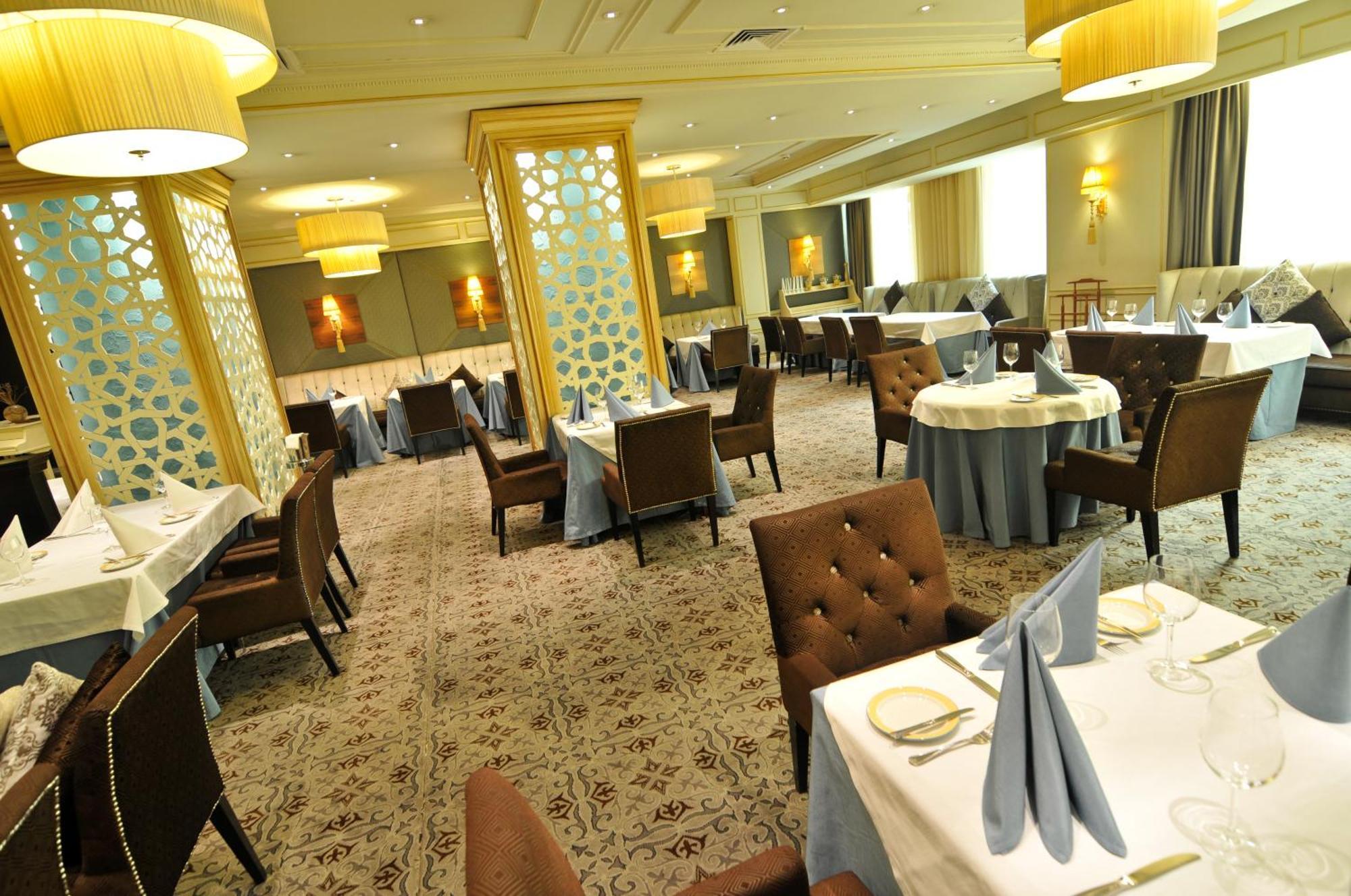 Grand Tien Shan Hotel Almaty Restaurant foto